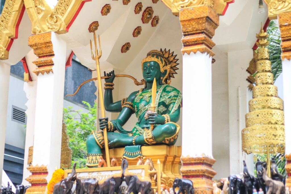 Indra Shrine with green deity statue at Ratchaprasong, Bangkok