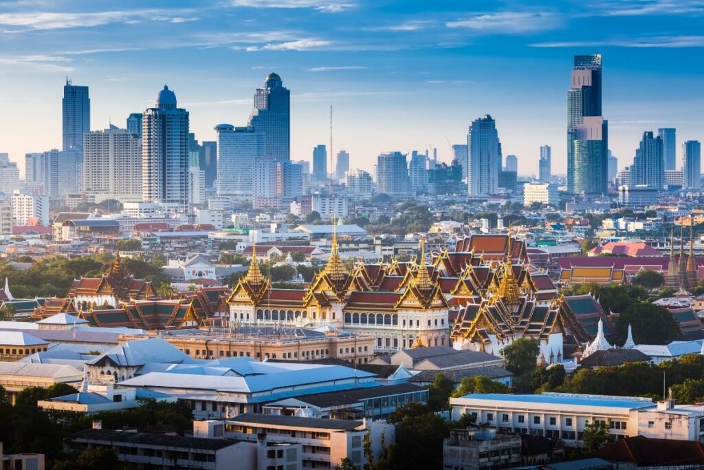 Bangkok city skyline with temples and modern buildings